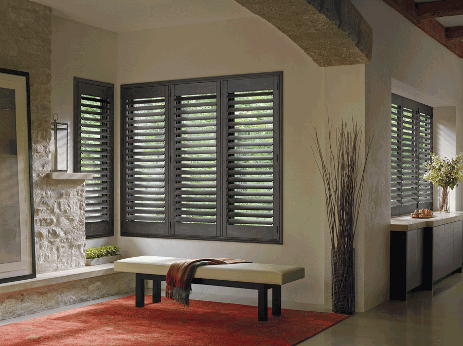 living room brown plantation Shutters best insulating window treatments Hunter Douglas St Paul 55113