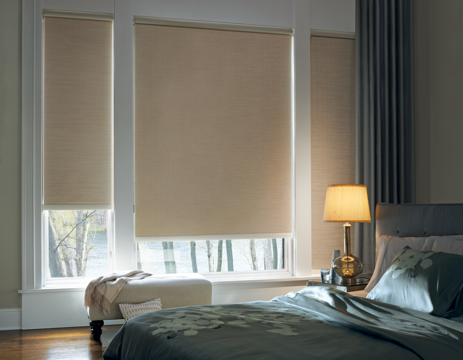 beautifully decorated guest room roller shades Hunter Douglas St Paul 55113