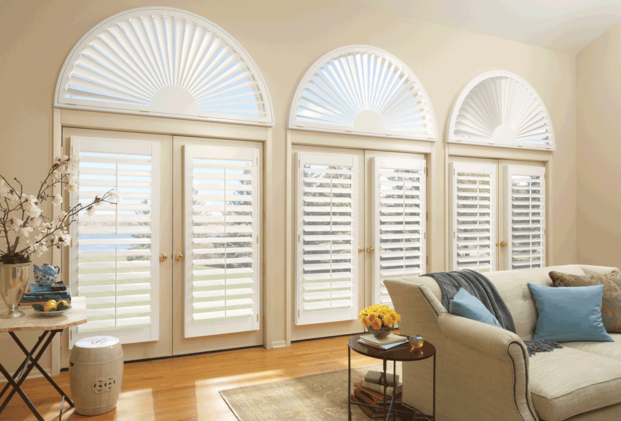 living room arched window treatments plantation shutters Hunter Douglas Maple Grove 55369