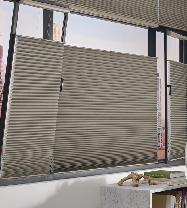 cover turn tilt windows with honeycomb shades Burnsville MN