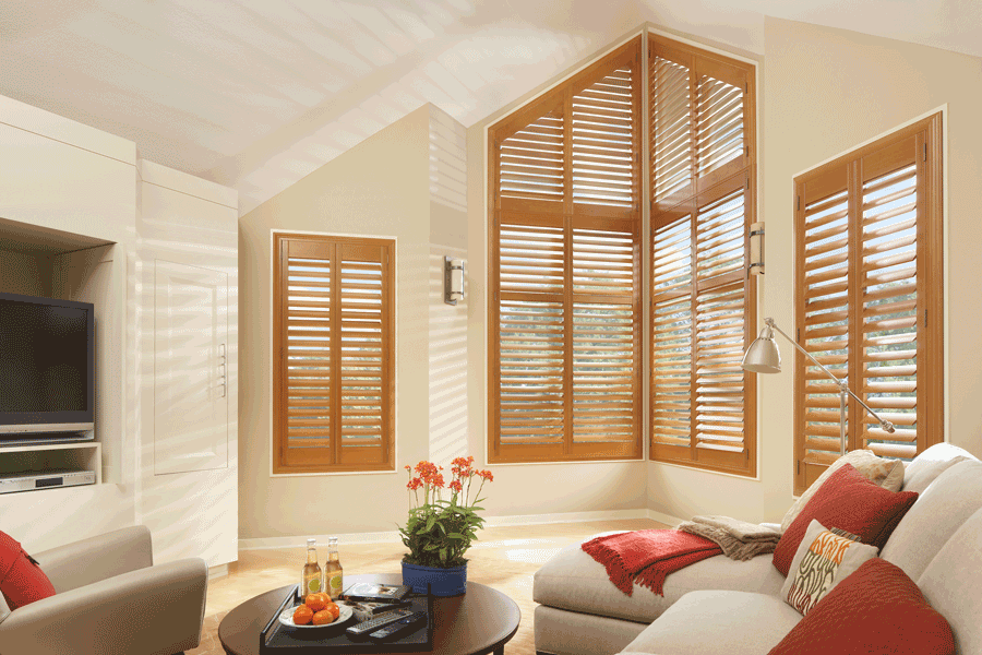 Custom plantation shutters on corner and angled window in Minneapolis home.