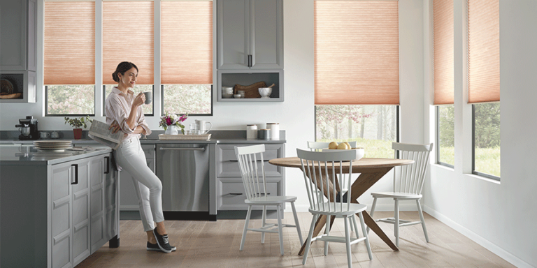 In this together, window shades in kitchen make the lighting perfect.