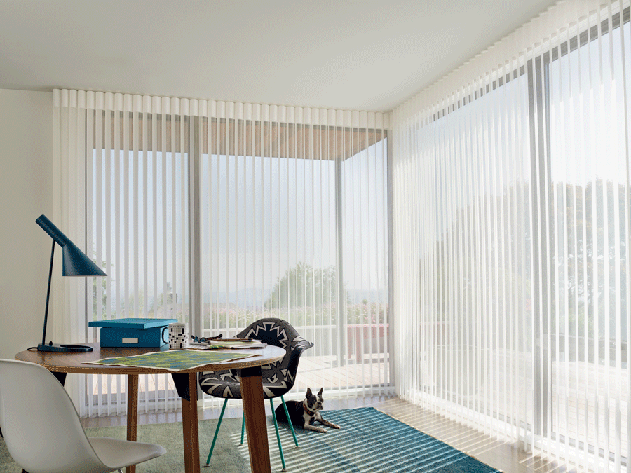 Sheer window treatments allow the natural light to flood into your home office.