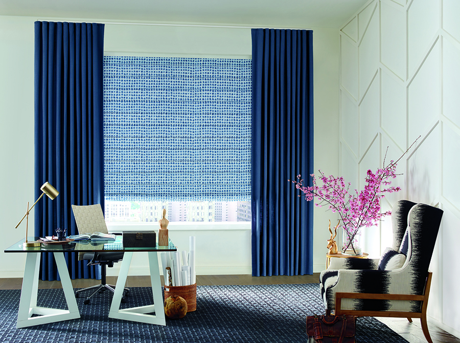 blue draperies and patterned roman shades