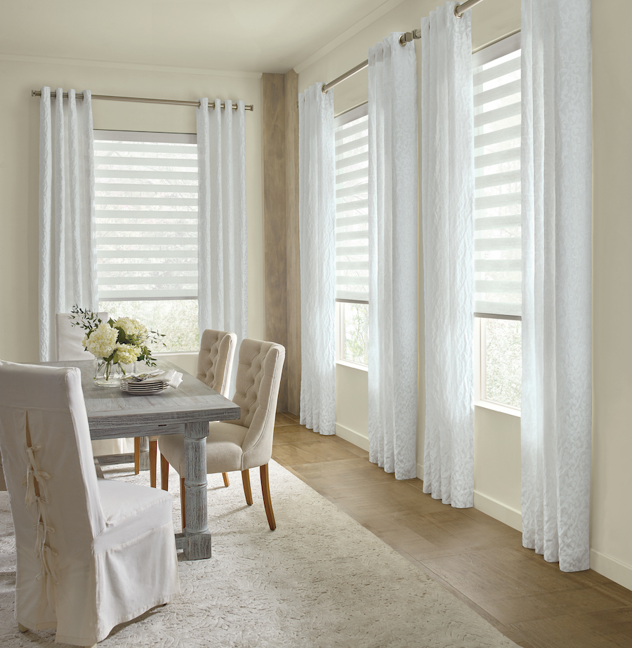 long drapes frame dining room windows in Maple Grove, MN