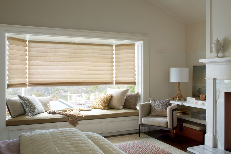 vignette bay window with gold fabric shades in living room of St paul Mn home