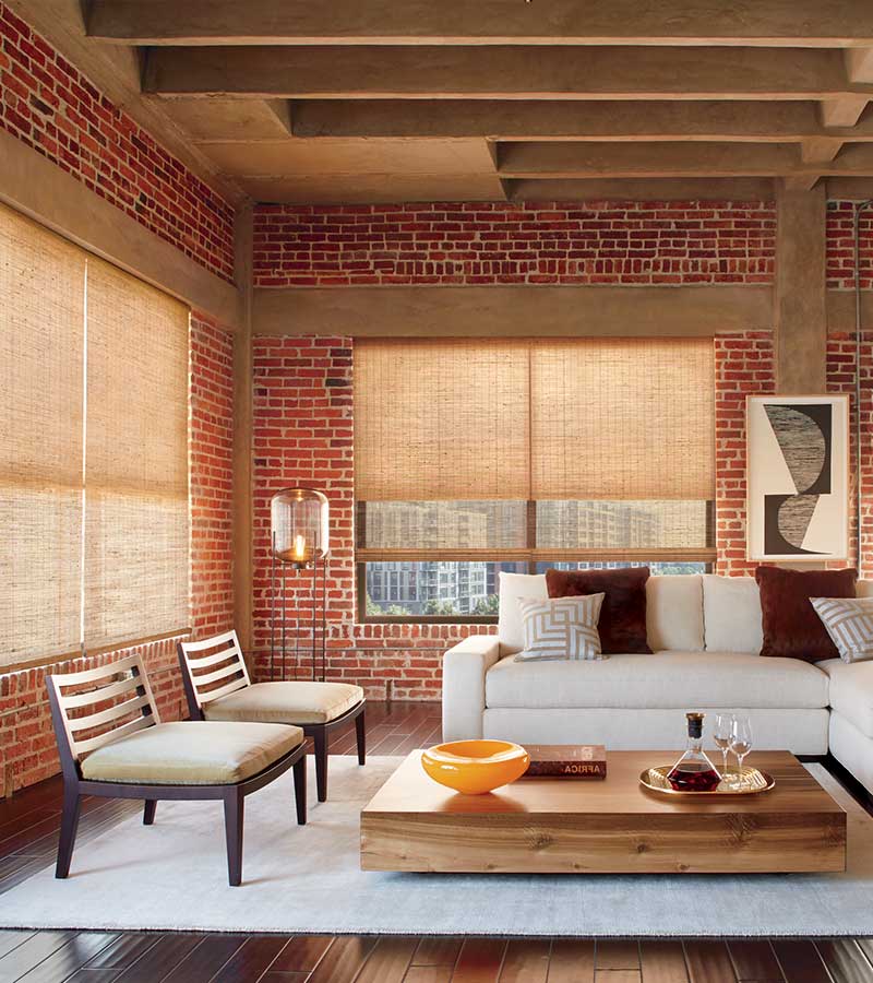 exposed brick loft with woven wooden window shades in Minneapolis MN