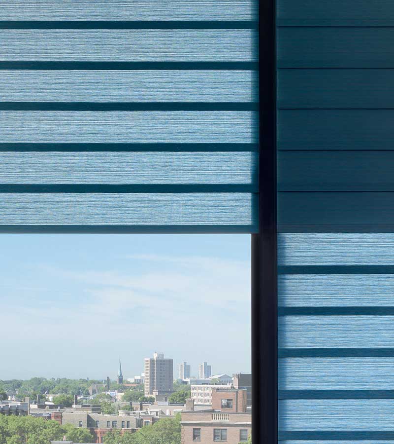 detail of blue dual shades as roman shades that roll in Minneapolis MN