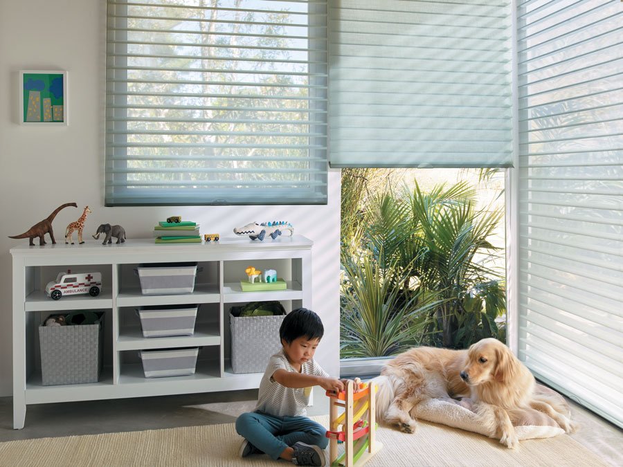 child's playroom with large windows covered with sheer shades in St Paul MN