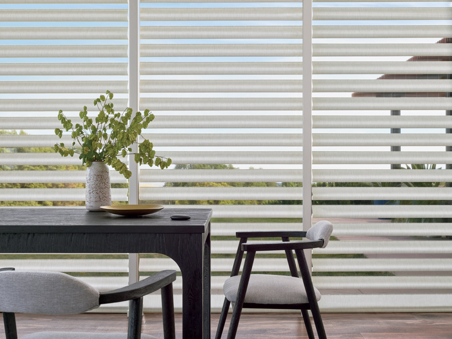 Wall to wall windows with pirouette shades