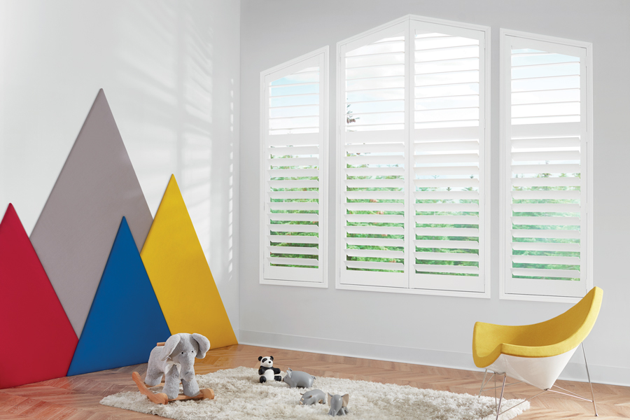 white shutters on angled windows in a playroom in Maple Grove MN