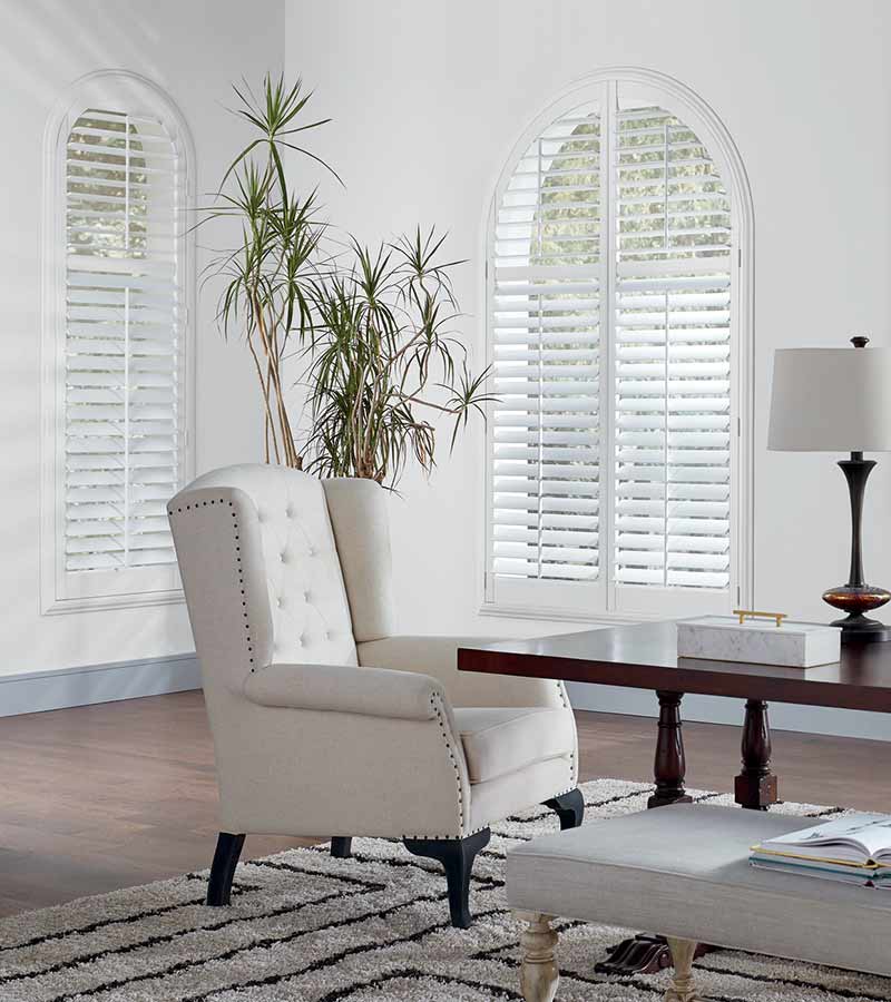home office white shutters in arched windows