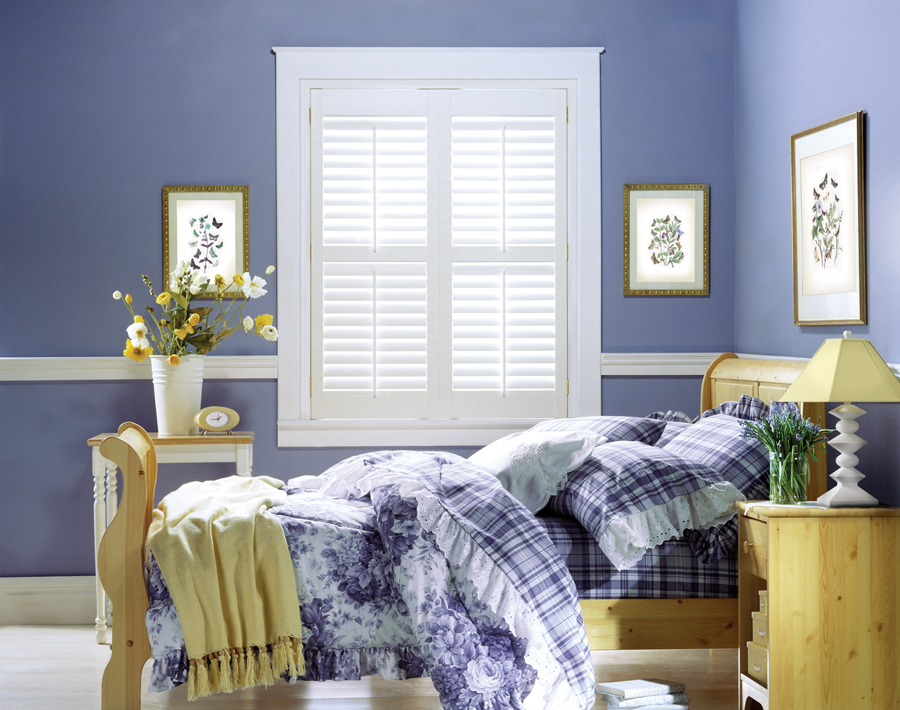 very peri painted walls in bedroom with white shutters in Maple Grove MN