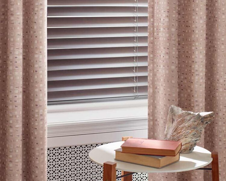 soft blush drapes with square patterns with rose gold aluminum blinds in burnsville, MN