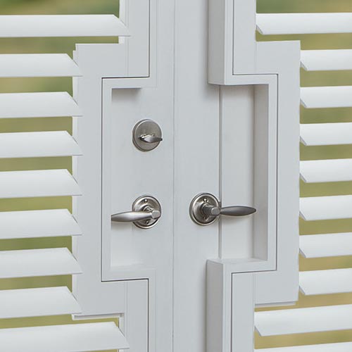 french patio doors with shutters and handle cutouts