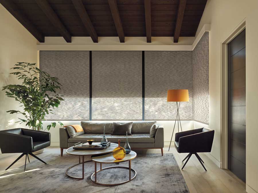 Alustra® Woven Textures® in a modern living room that is filled with neutral tonesliving room with floor to ceiling windows