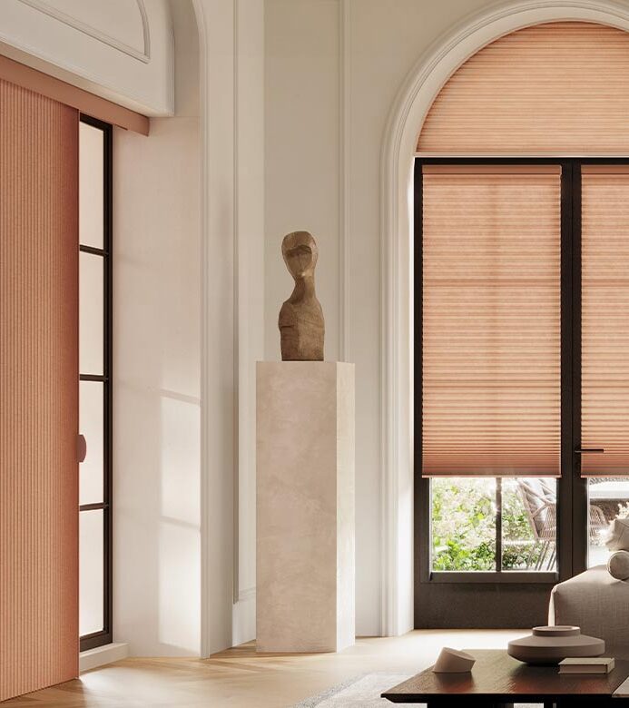 living room with peach duette vertiglide shades maple grove