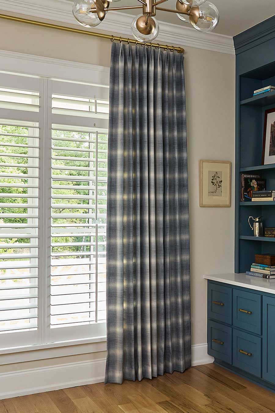 blue and white plaid drapery with white window blinds