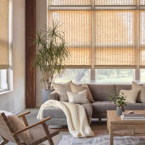 woven-shades-boho-chic-hunter-douglas-provenance-aero-drapery-and-blind living room with light brown woven window blinds