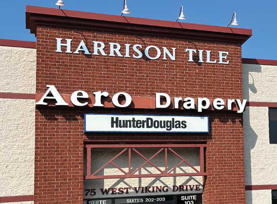 store front of aero drapery and blind