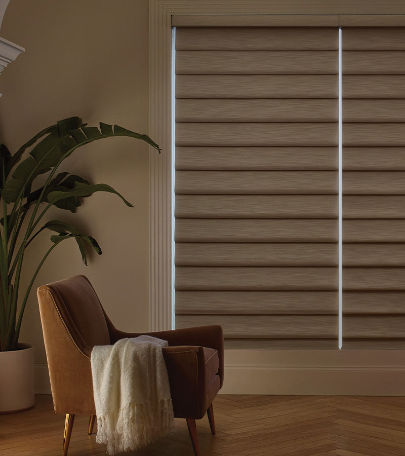 neutral shades in living room with blackout shades
