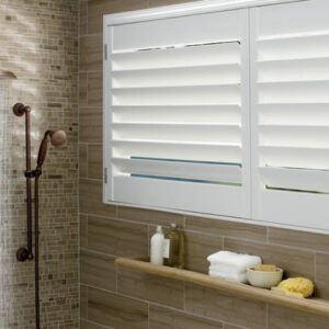 White Palm Beach™ Polysatin™ Shutters on a shower window