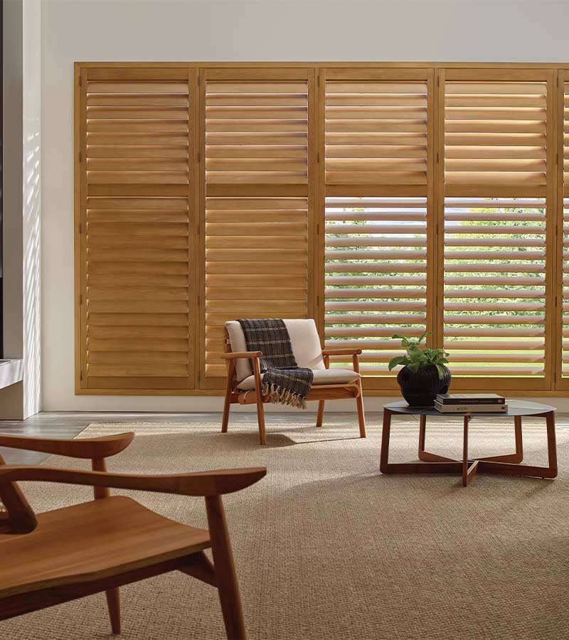 energy-efficient-heritance-hardwood-shutters-window-treatments-aero-drapery-and-blind wood shutters for large window in living room energy efficient