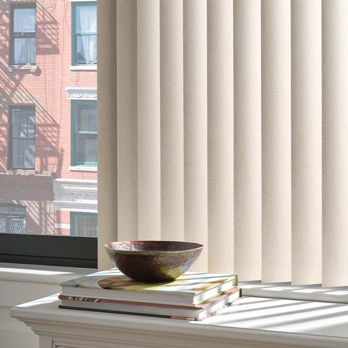 light filtering vertical blinds on patio doors in Minneapolis home