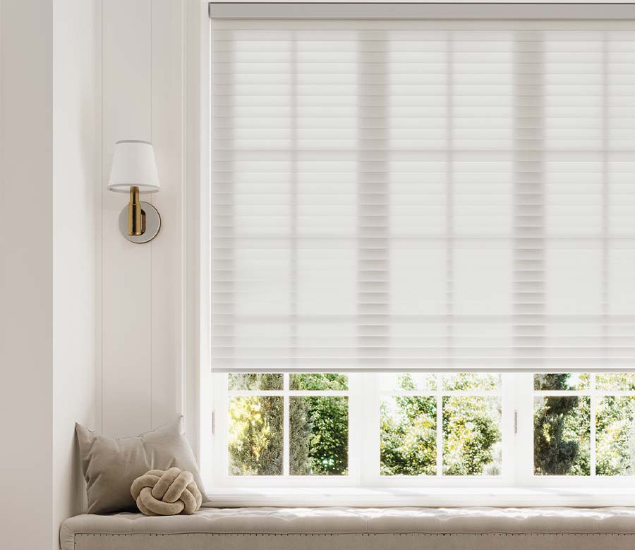 white shades on window seat on large window