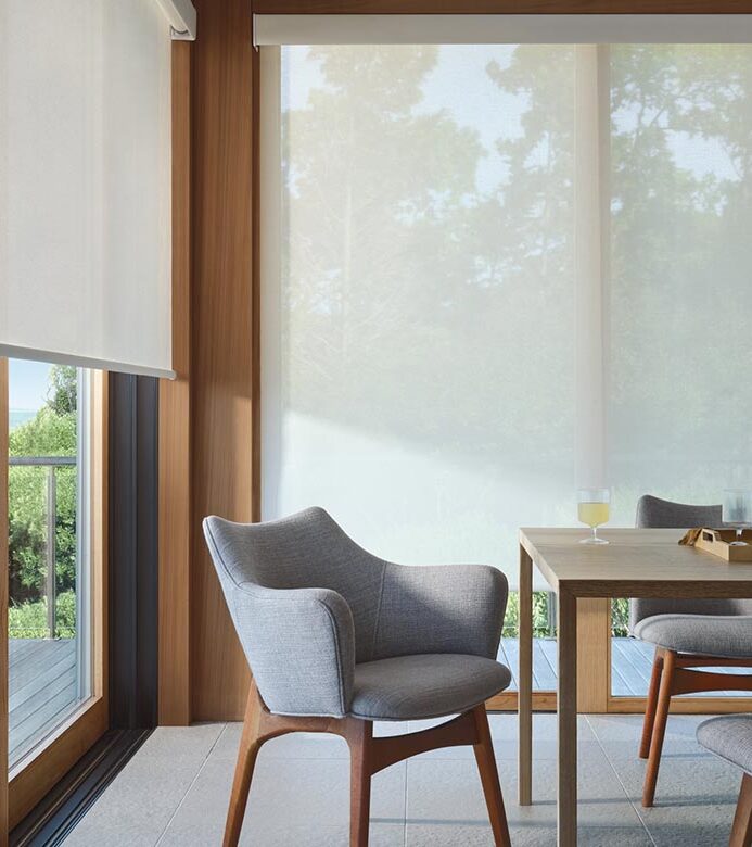 dining room with floor to ceiling screen shades
